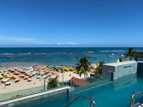 Flat beira mar com varanda em Porto de Galinhas